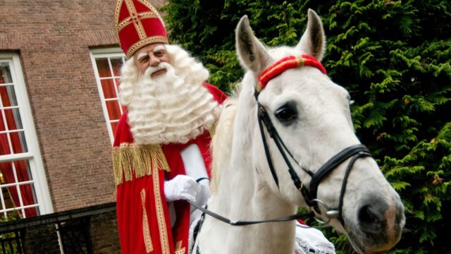 Sinterklaas on white horse